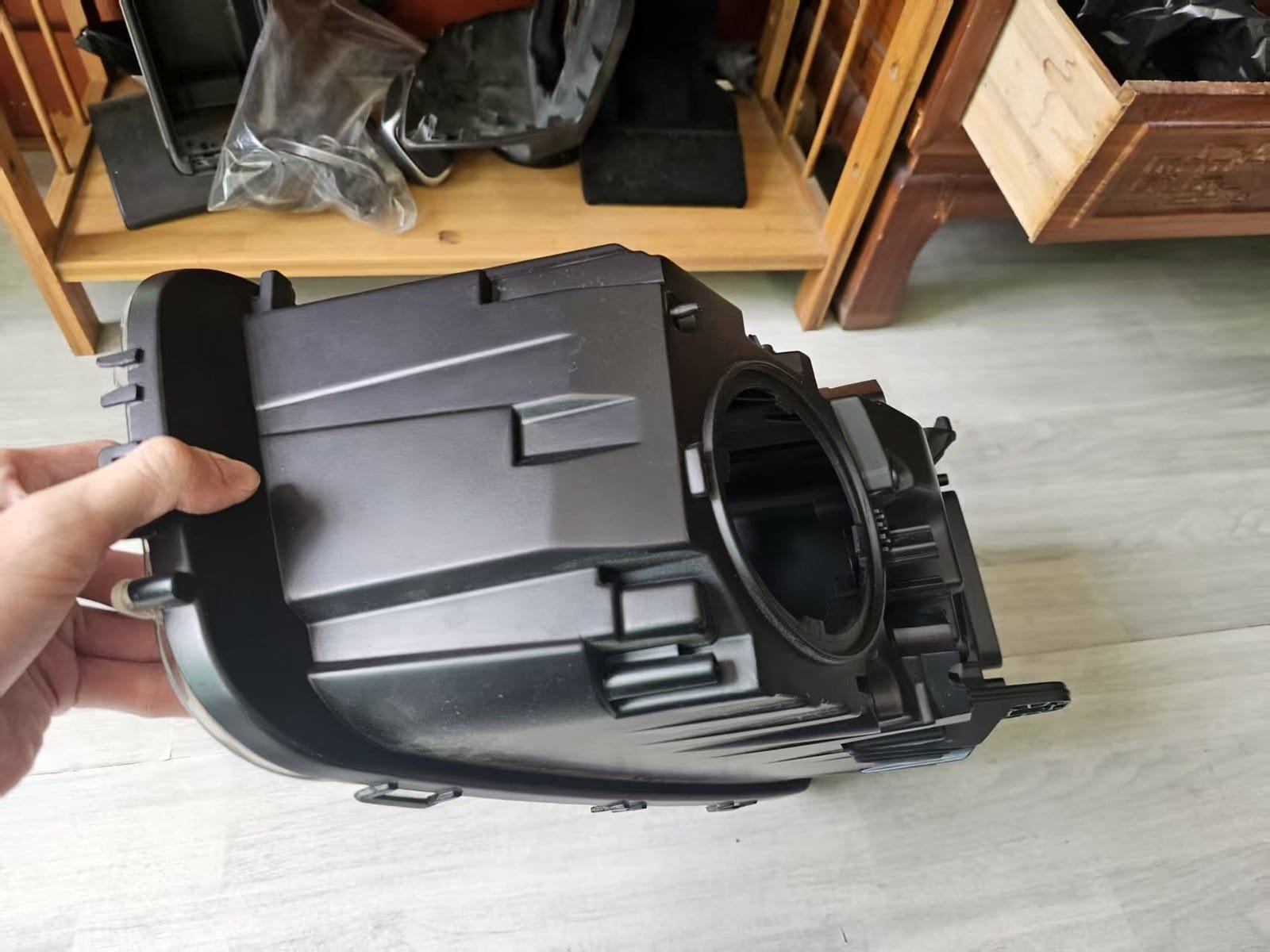 Black headlamp housing shown separately
