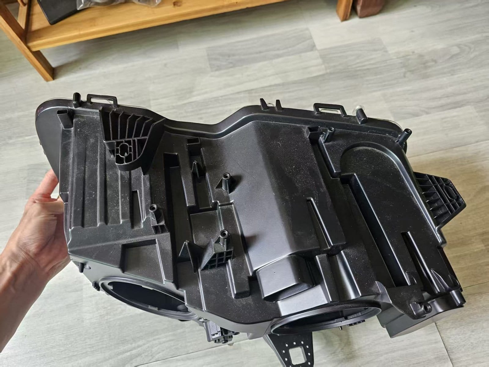 Rear geometry of an automotive headlamp prototype with visible interfaces