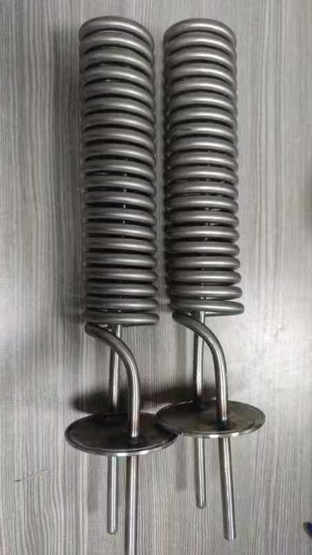 Two complete helical cooling tube assemblies with visible coil bodies and end interfaces