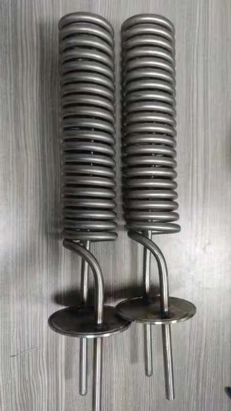 Two complete helical cooling tube assemblies with visible coil bodies and end interfaces