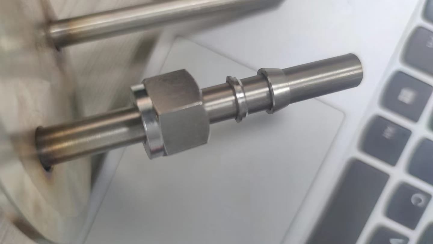 Helical tube assembly interface and end hardware